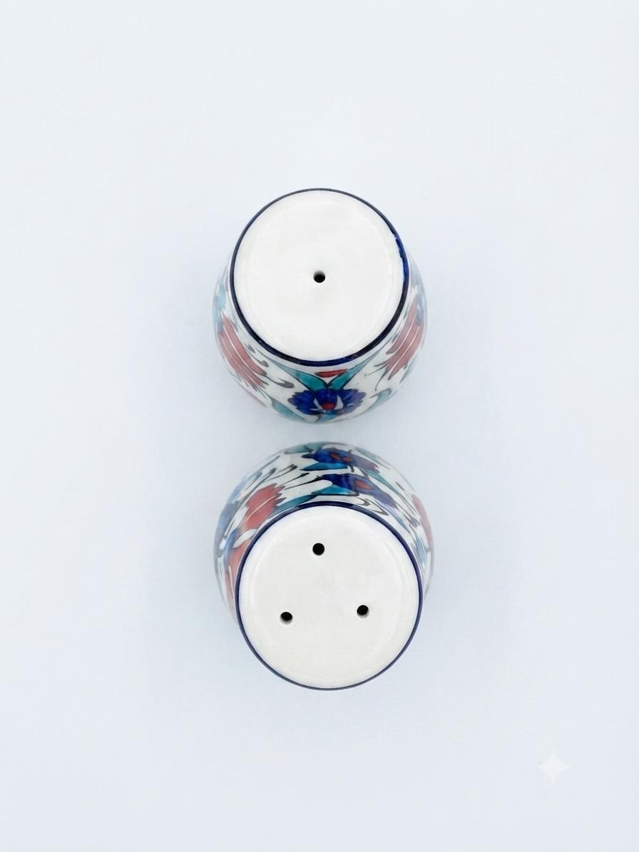 Top view showing the dispensing holes of the ceramic shaker set