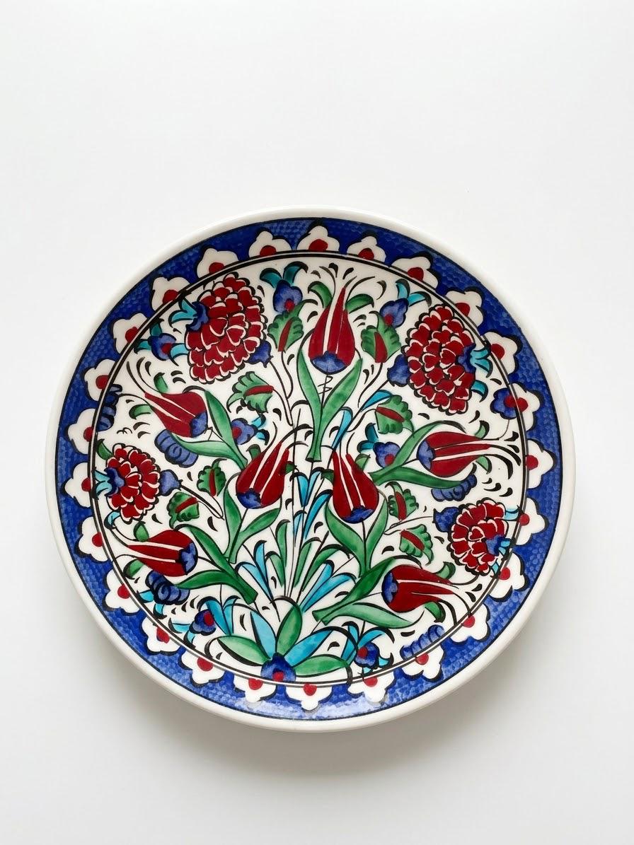 Angled view of the hand-painted Ottoman ceramic serving plate