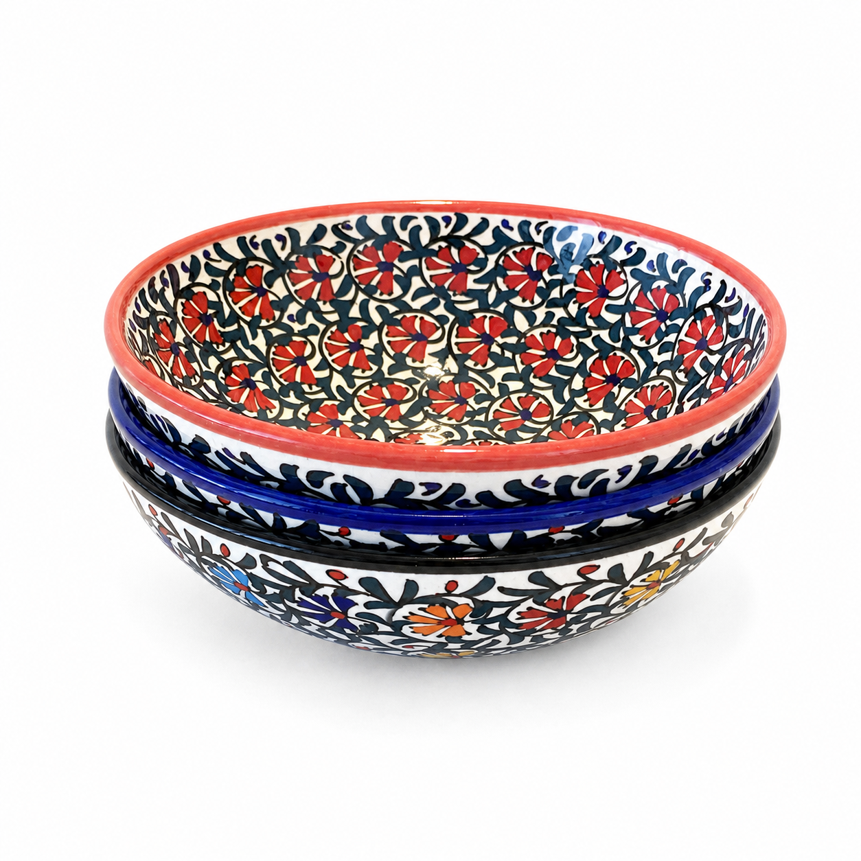Three stacked hand-painted Clove bowls